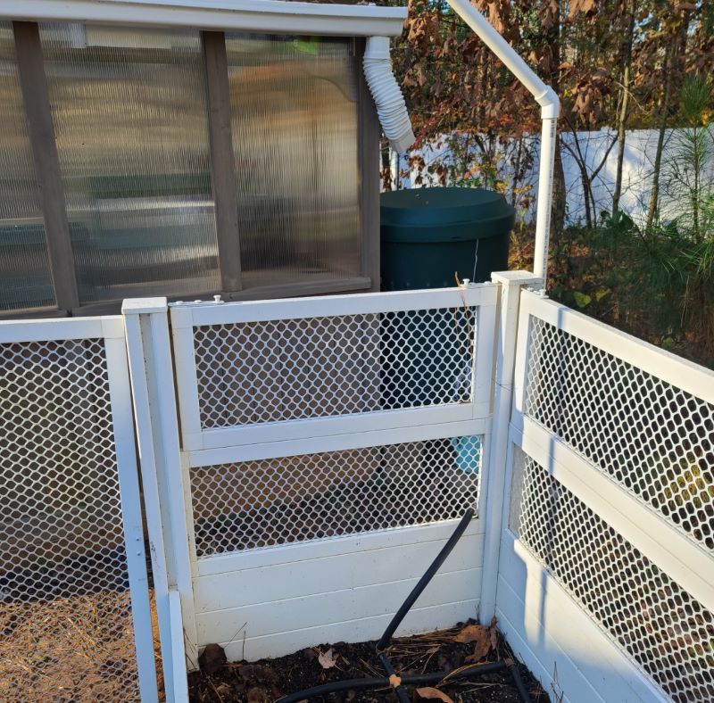 Rain Barrel Set up part one, gutter to rain barrel, off greenhouse, leading to drip irrigation 
